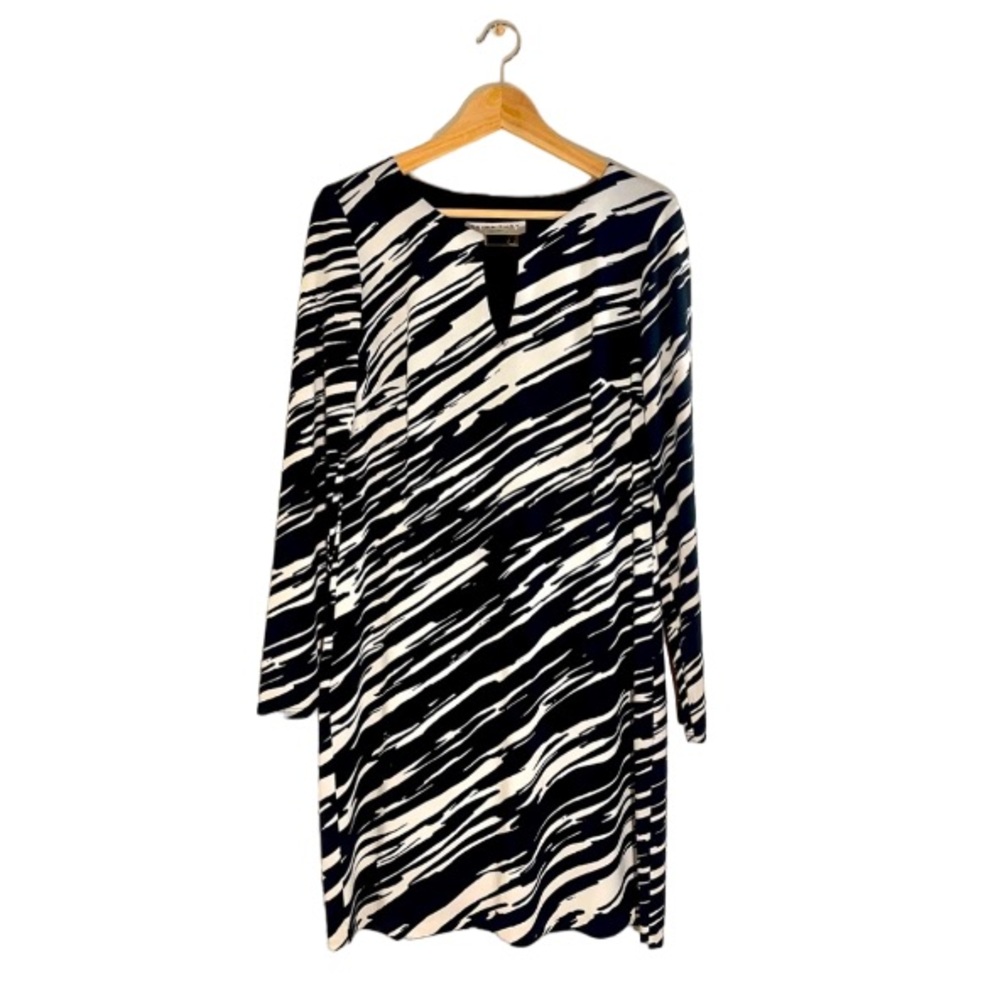 Trina Turk dress size 4 long sleeve cream and black pattern gold detail lined